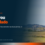 Torres de transmissão em campo aberto, representando o armazenamento de energia conectado à rede